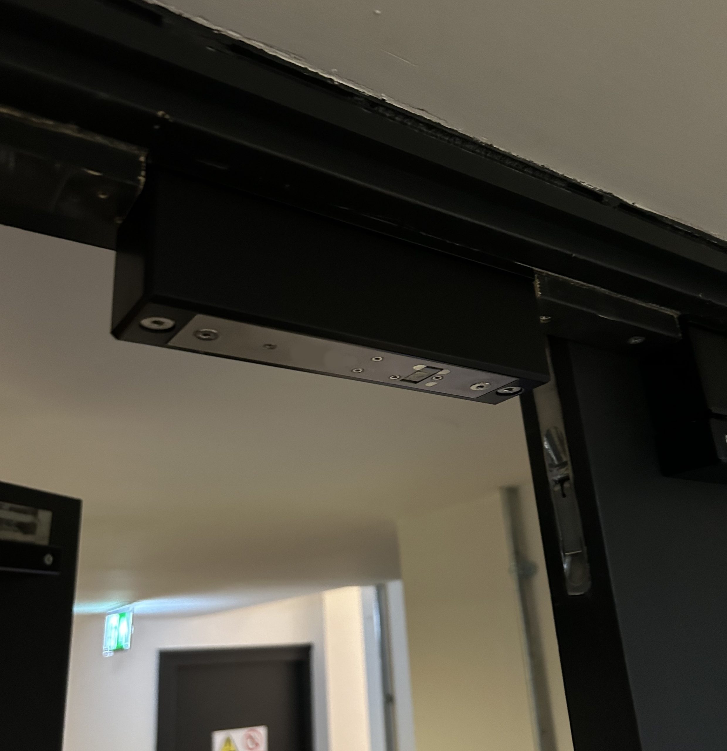 A maglock replacement installation in an historic building