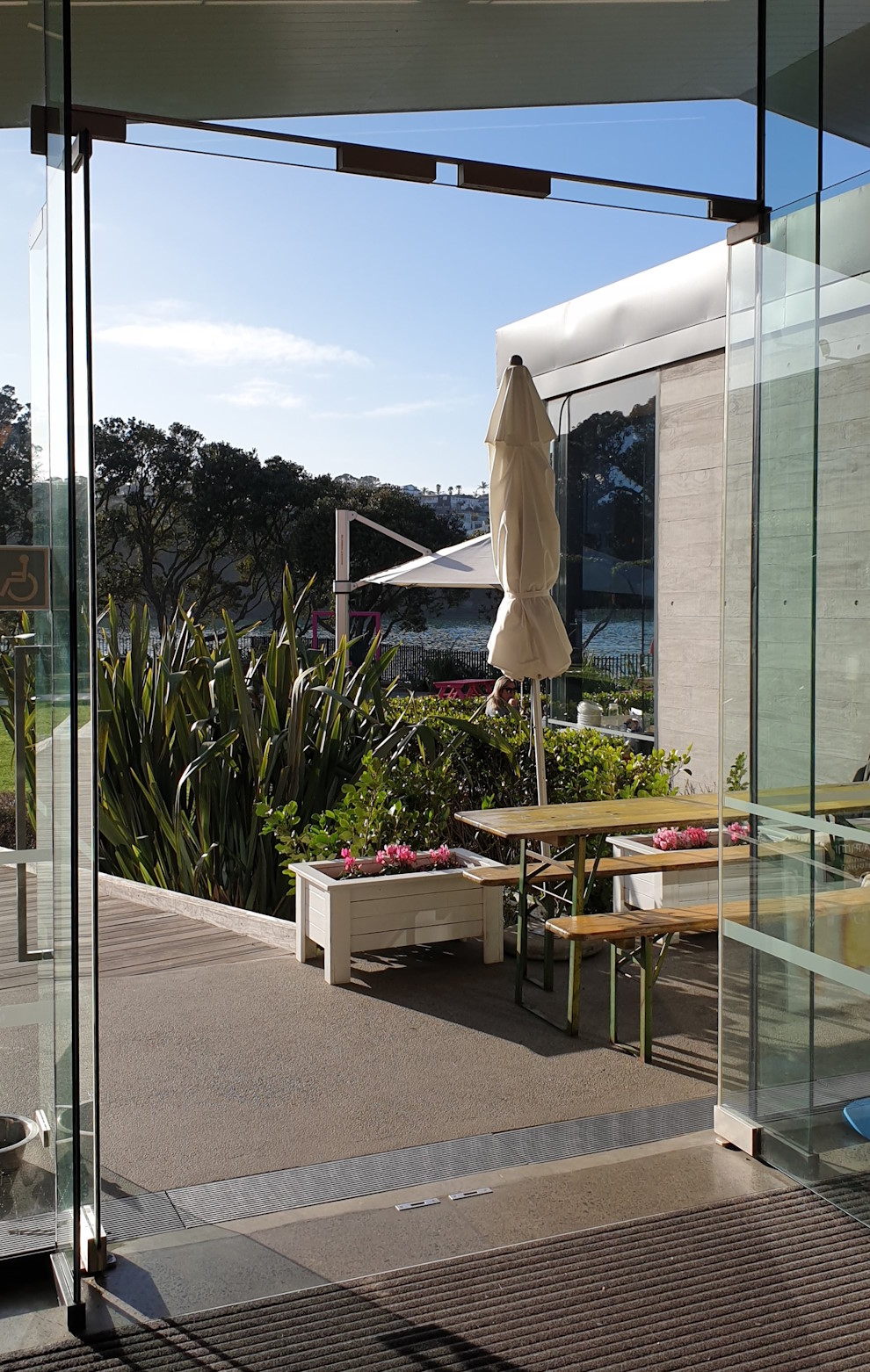 Swing through entrance doors for a waterfront café