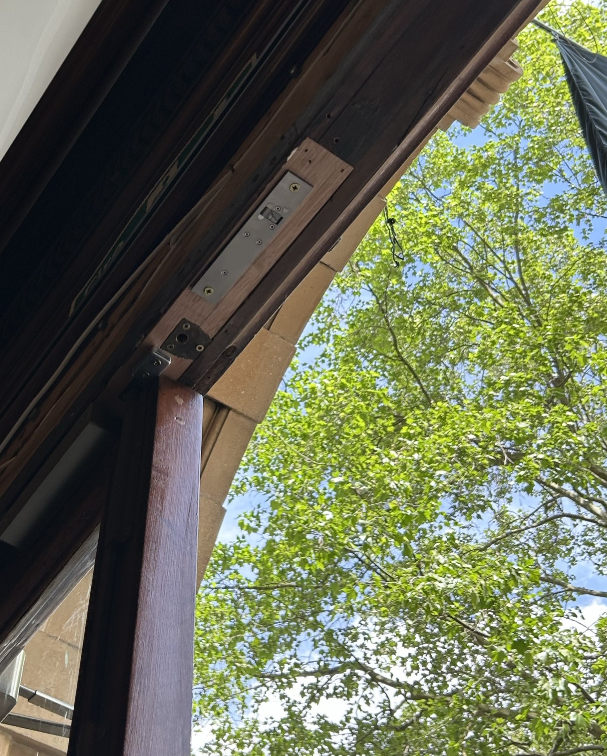 Replacement of an existing solution into the door header of a public building