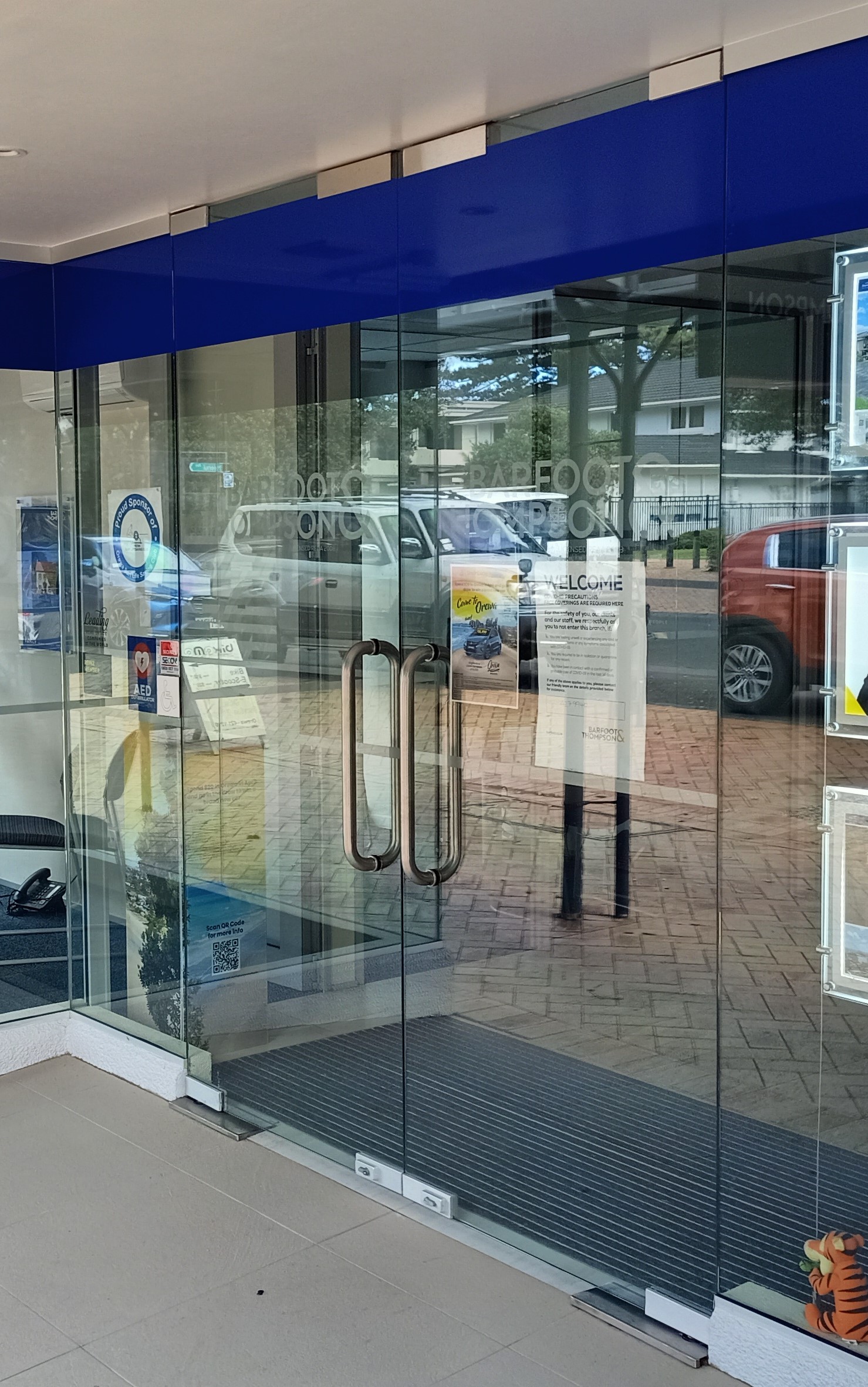 Access controlled glass doors with locks installed above the doors