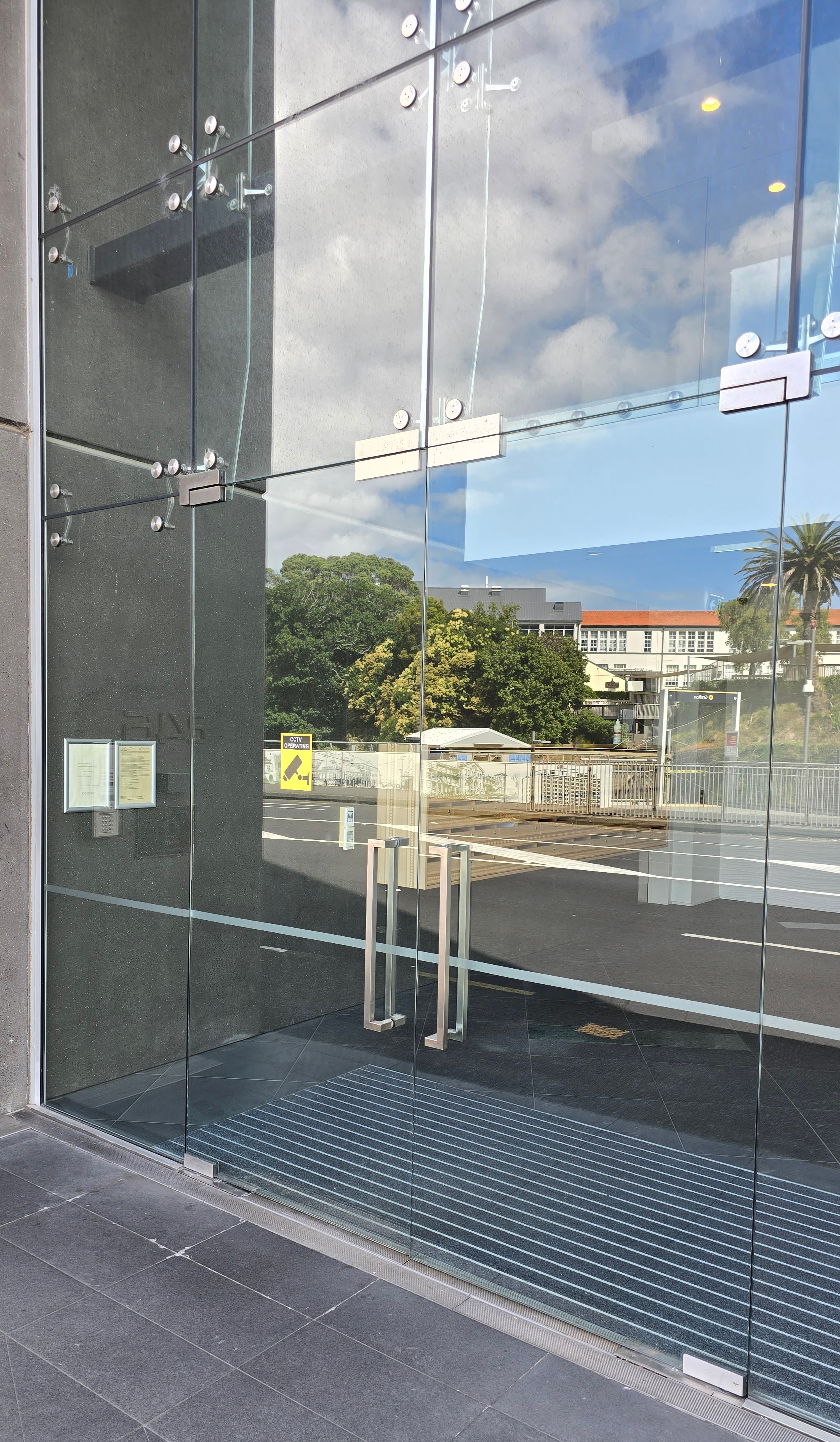 High usage glass entrance doors for a shared apartment / office building
