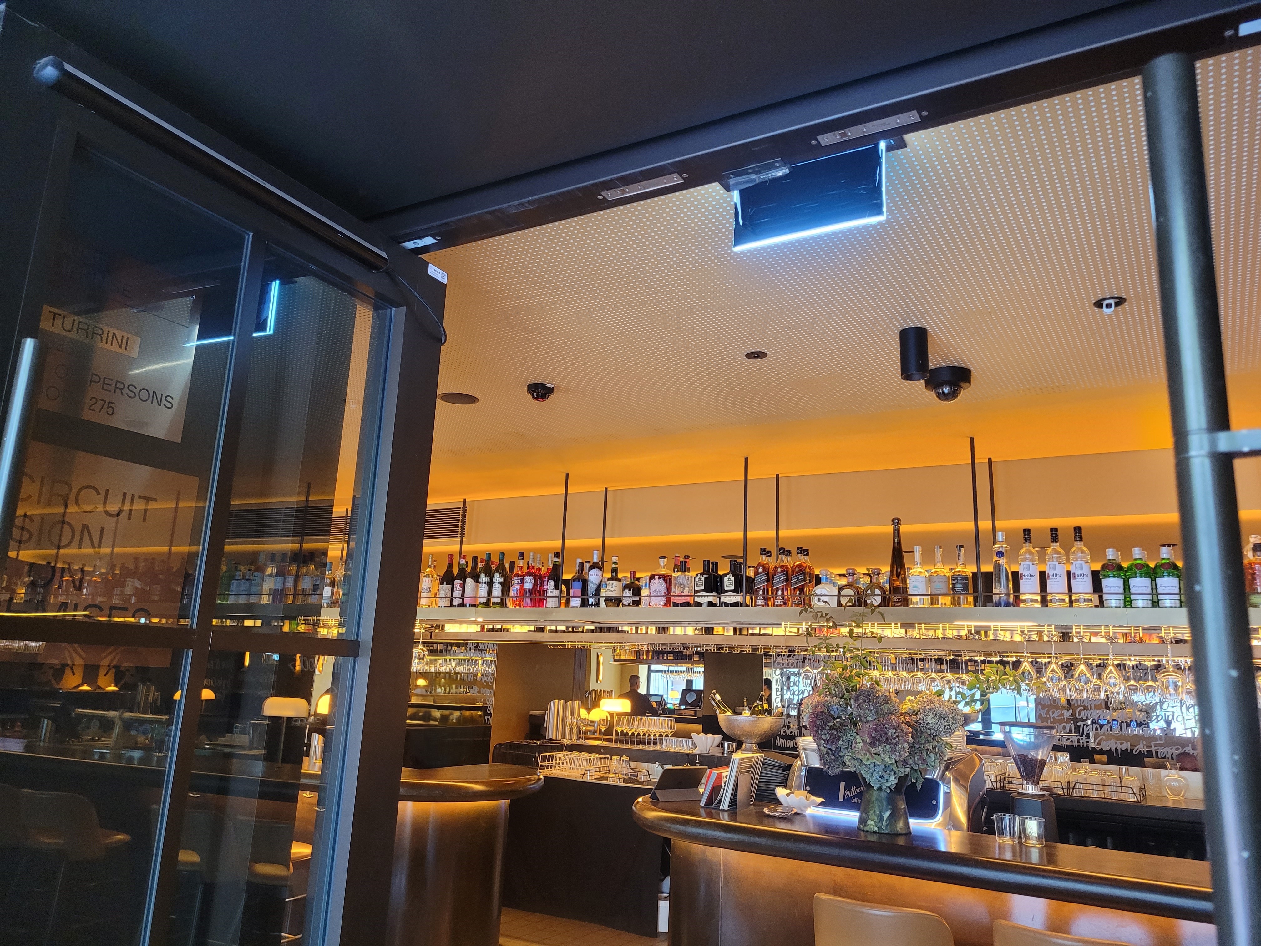 Flush morticed install on aluminium entrance doors for this inner city bar