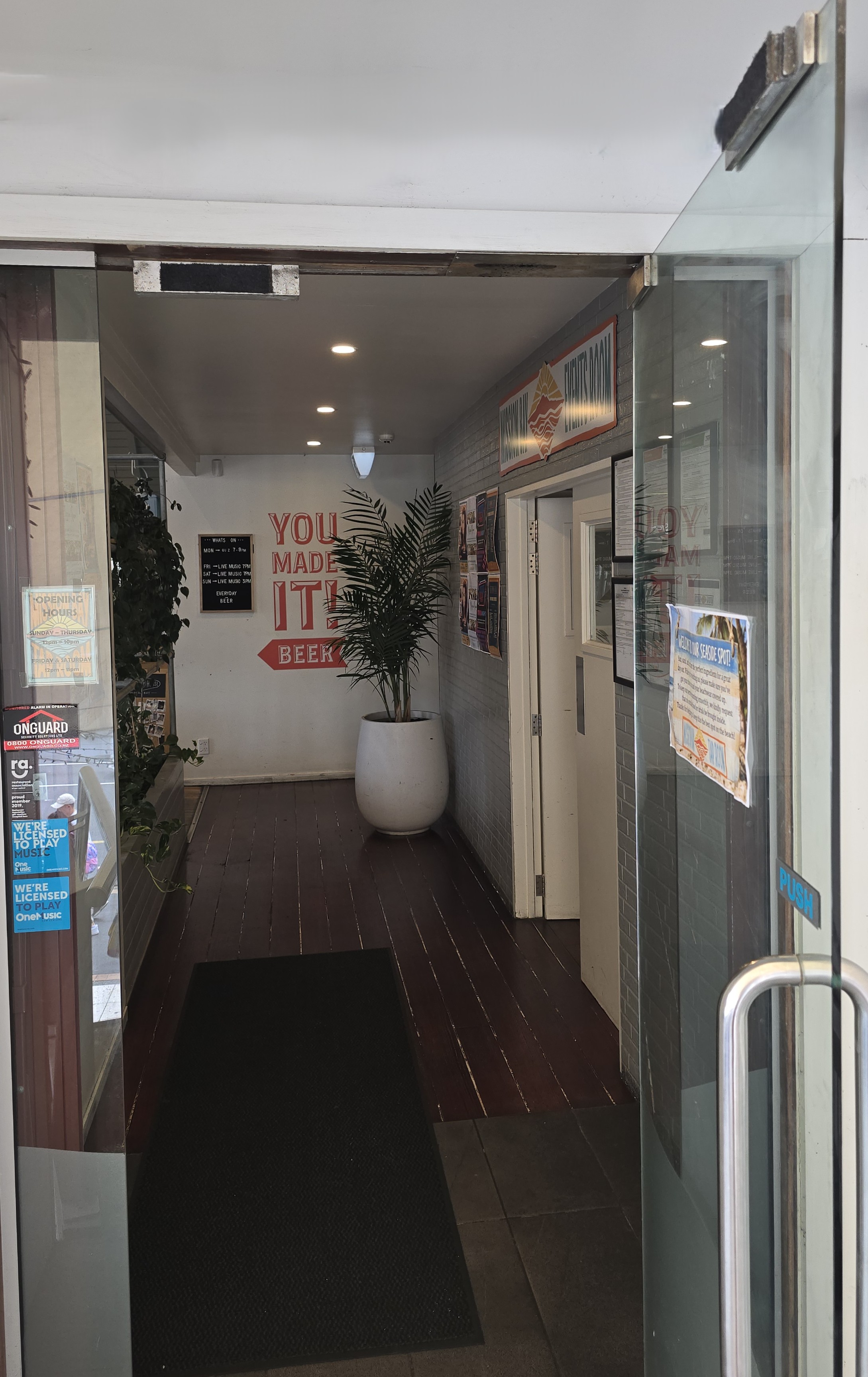 Maglock on glass door with carpet stuck to the magnet and strike to prevent door bang!